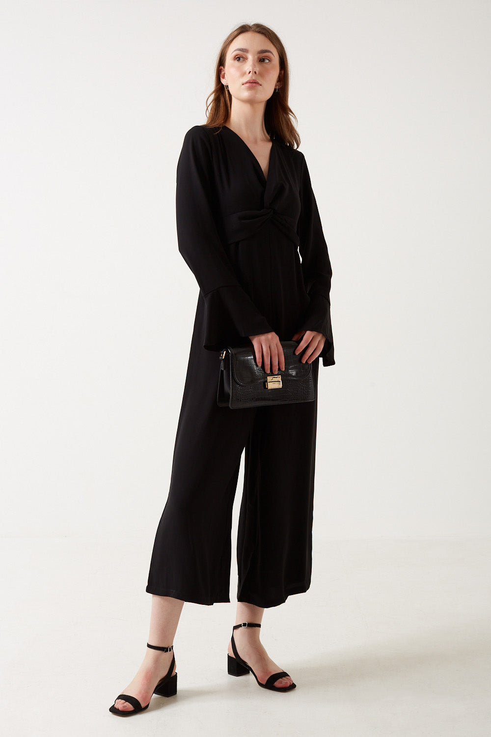 Marc Angelo Hannah Bell Sleeves Jumpsuit 8 Pieces per Pack 1 x size 8 2 x size 10 2 x size 12 2 x size 14 1 x size 16 Black